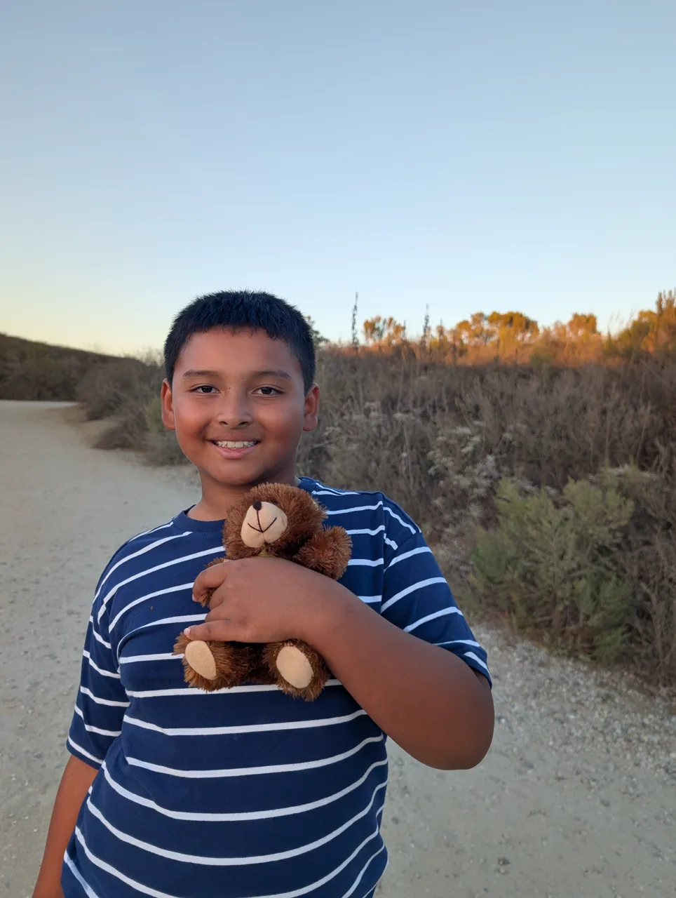 Ray holding Mr. Bearry on the Baldwin Hills trail